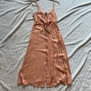 Light salmon colored button up dress